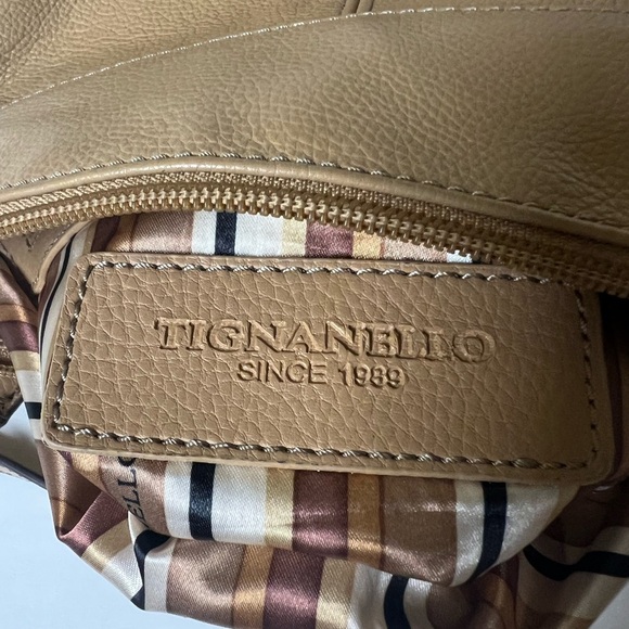 TIGNANELLO TAN LEATHER CROSSBODY BAG
9”x 8” STRIPED INTERIOR LINING - Picture 3 of 7